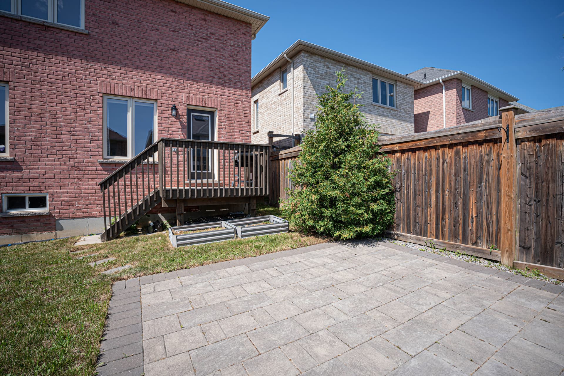 A Private Backyard And A Basement Full Of Potential