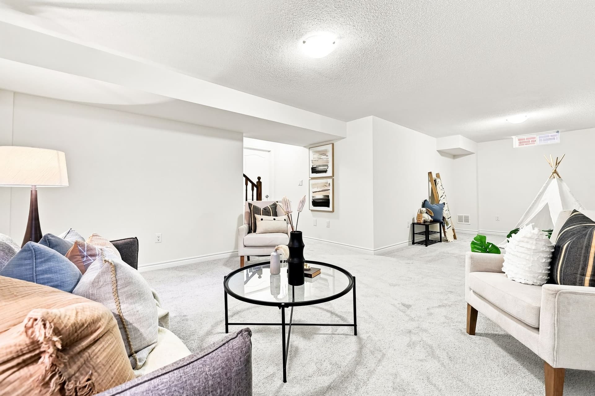 A Finished Basement With Its Own Walk-Up To The Yard