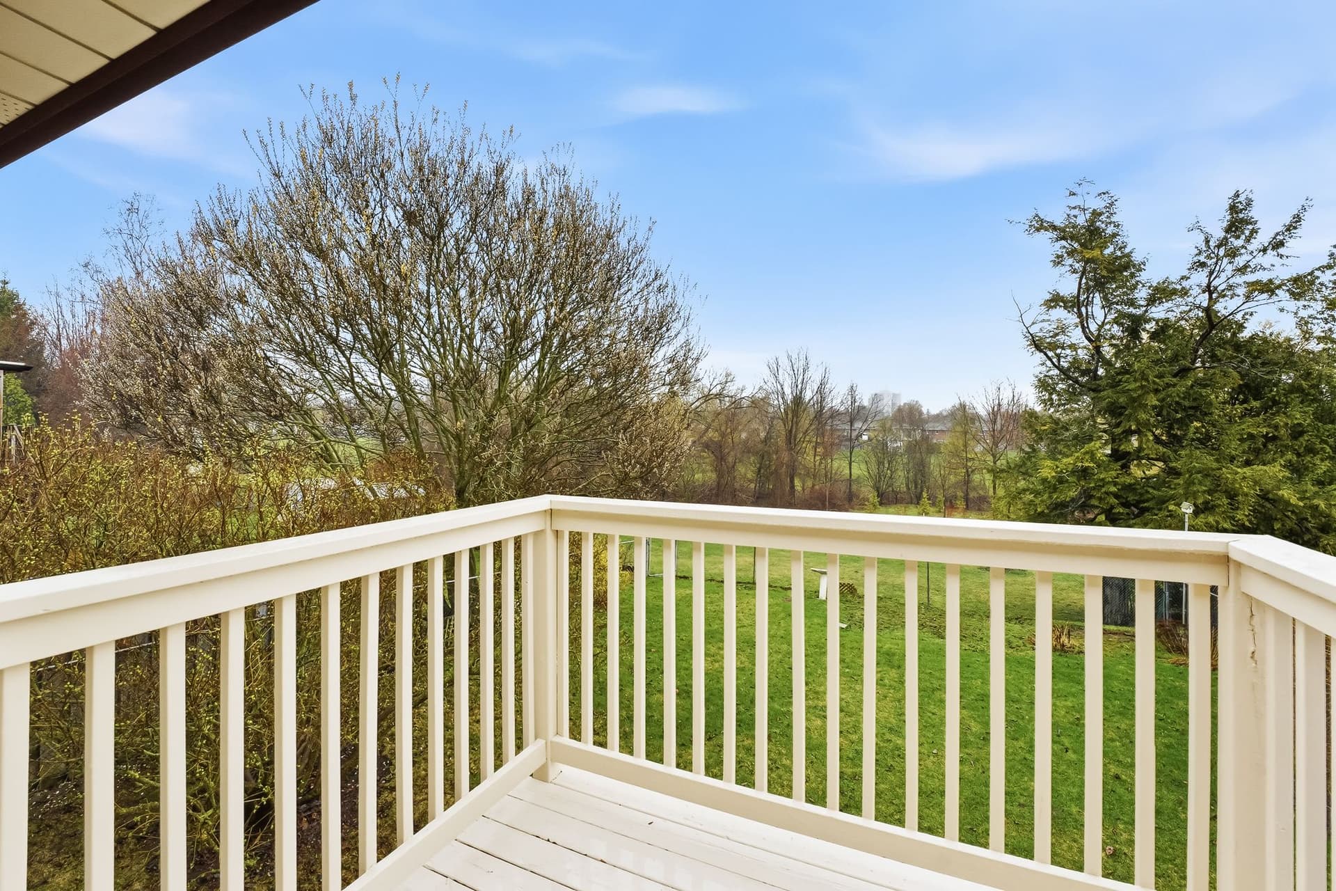 Three Main-Floor Bedrooms With A Walkout Balcony