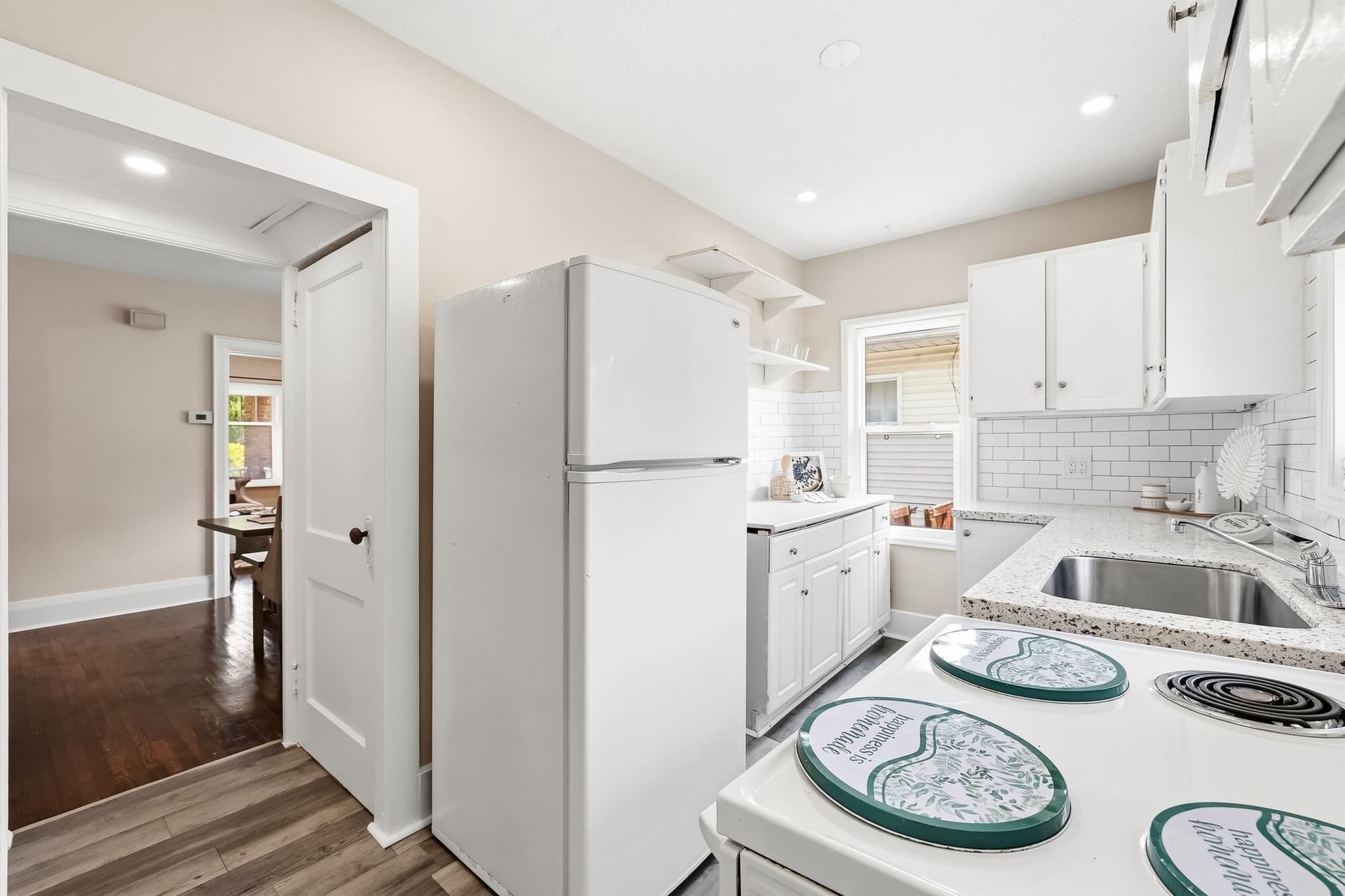 A Bright Kitchen And A Bathroom That Surprises