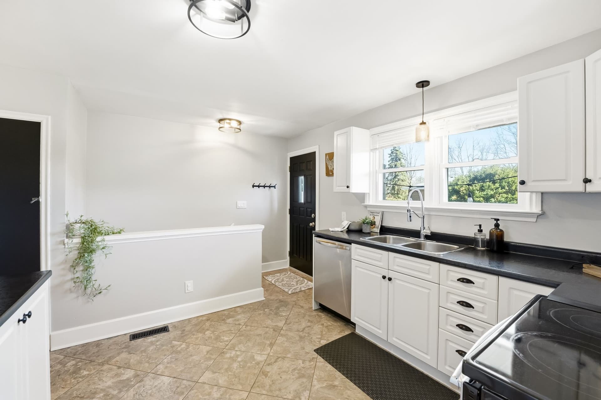 A bungalow, a deep private yard, and a downtown you can walk to.